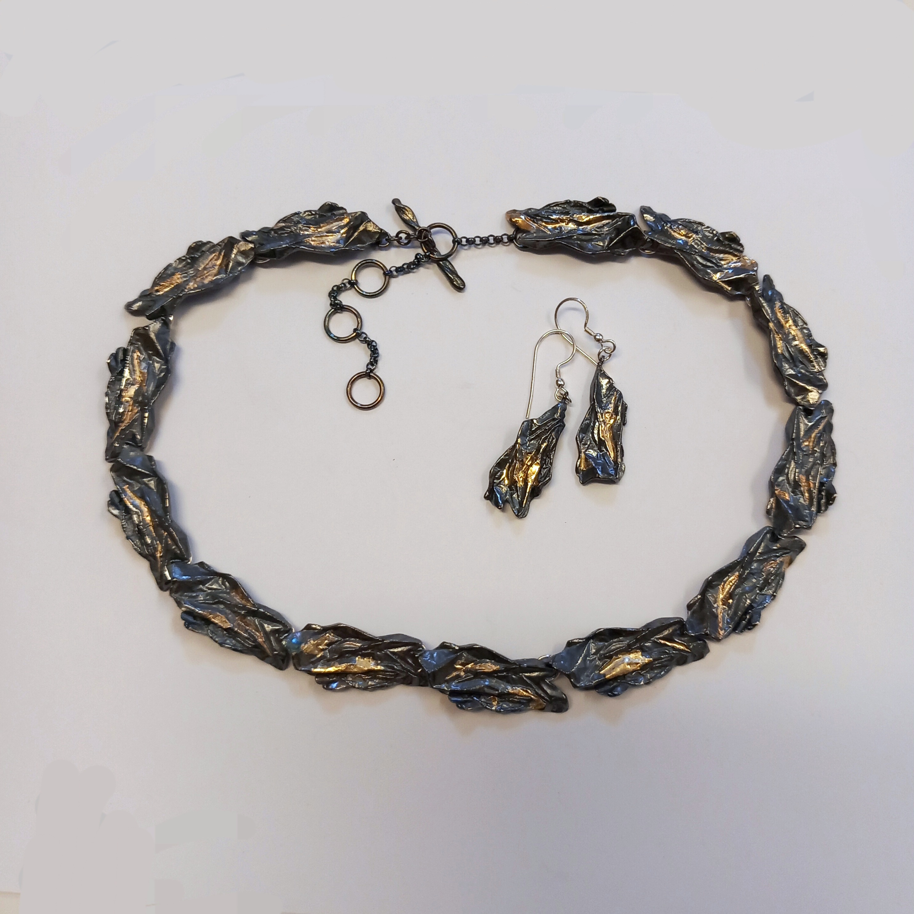 oxiderat silver, 18k guld